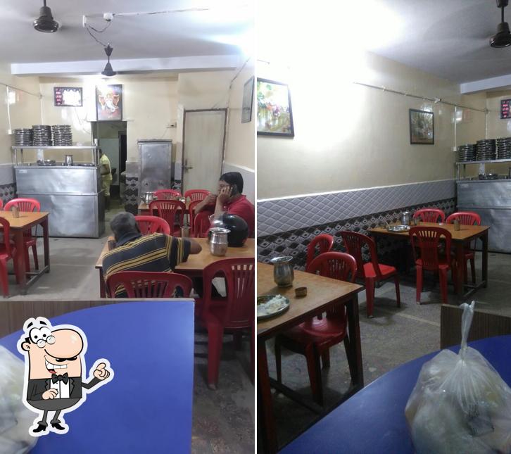 Take a seat at one of the tables at Shri Rajasthan Bhojnalaya