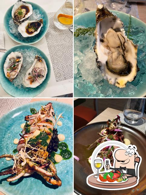 Toma marisco en Plática Restaurante