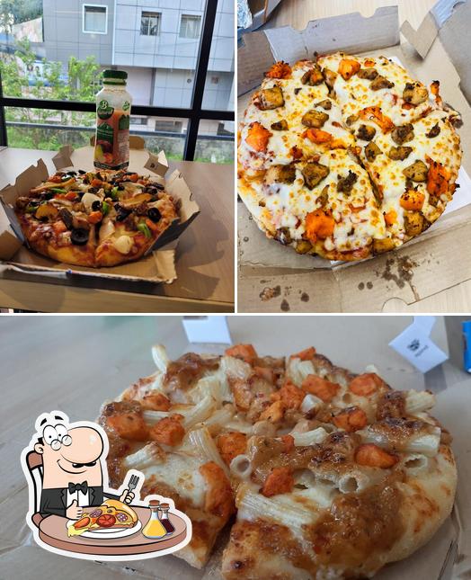 Try out pizza at Domino’s Pizza Thiruvalla