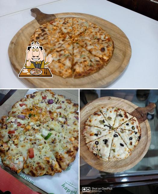 Get pizza at Arabica Cafe Club