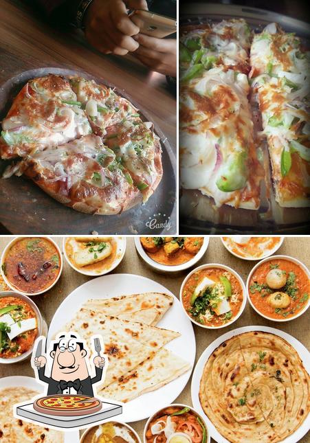 Get pizza at Narayan Restaurant