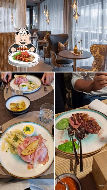 Restaurant Bar Tower Garden si caratterizza per la cibo e interni