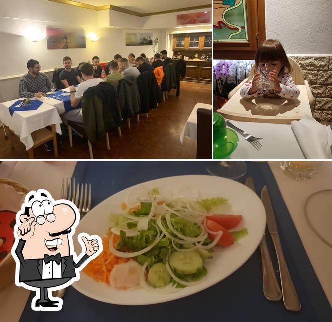 La foto di interni e cibo da Trattoria du Commerce