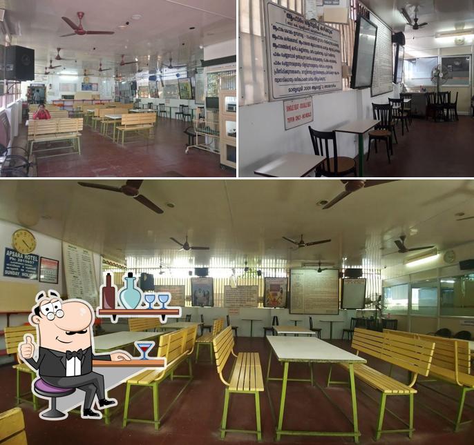 Take a seat at one of the tables at Apsara Hotel