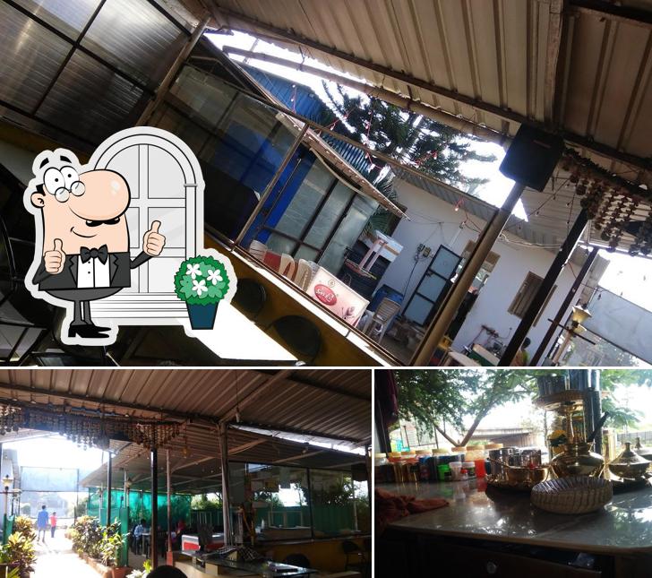 The image of exterior and interior at Nisarg Hotel