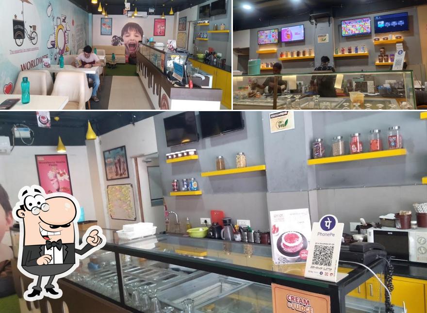 Take a seat at one of the tables at Cream and Fudge