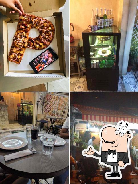 Take a seat at one of the tables at Francesco's Pizzeria