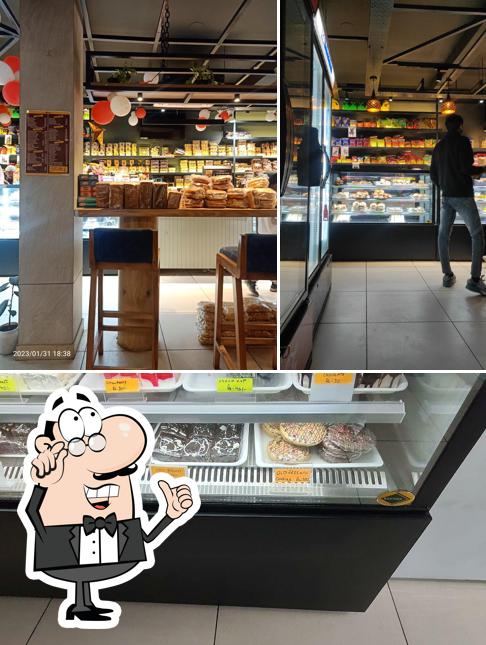 The interior of Old Friends Bakers and Cafe / 100 % Eggless / Best Bakery / Customized Cakes / Cake Shop