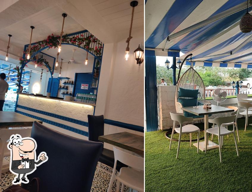 Take a seat at one of the tables at White lama villa