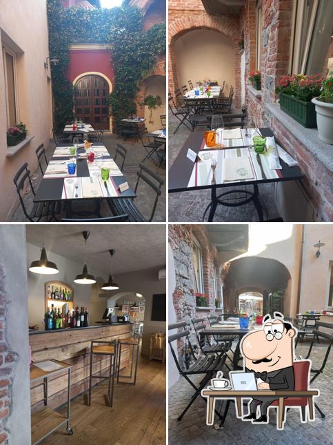 Siediti a un tavolo di Osteria Il Cortile