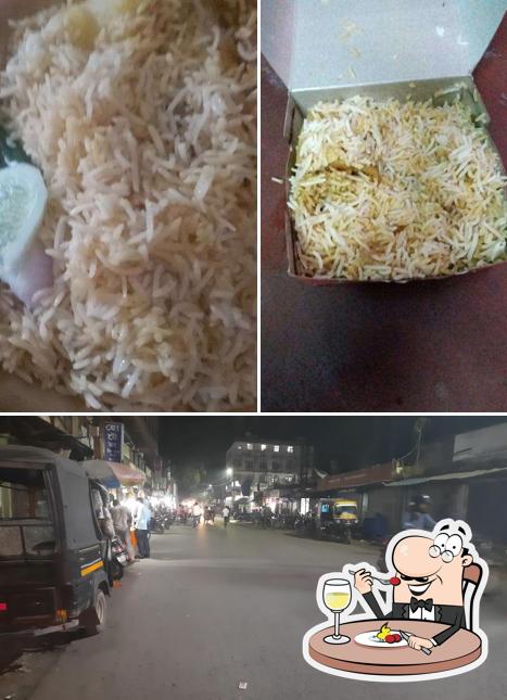 Take a look at the image displaying food and exterior at Kolkata Haji Roll center