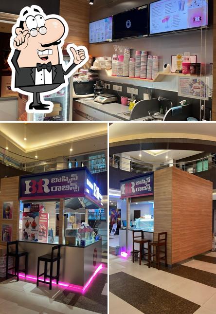 Take a seat at one of the tables at Baskin Robbins