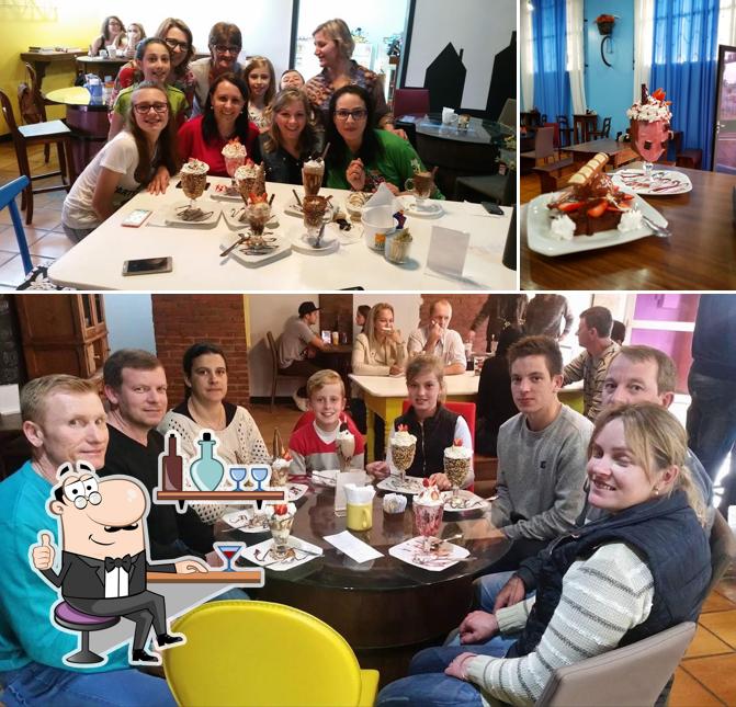 Entre diversos coisas, interior e mesa de jantar podem ser encontrados no Doces Momentos Restaurante