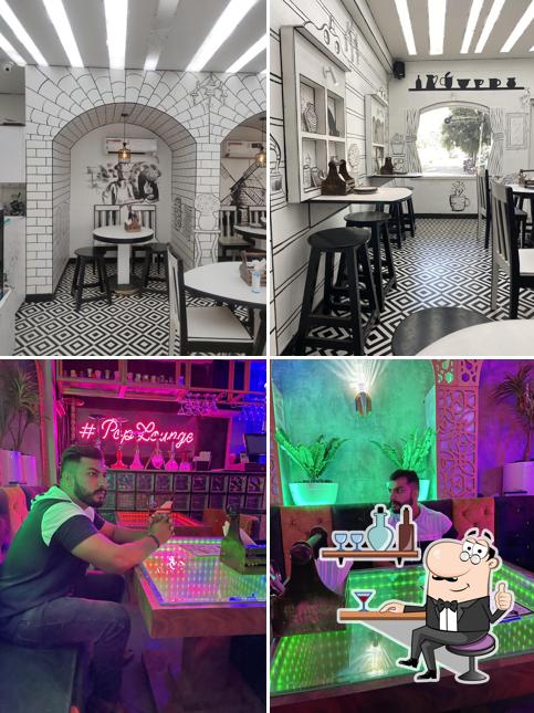 Take a seat at one of the tables at Paper art cafe - Cafe / Best Cafe / Coffee cafe / Best Lounge / 2d Cafe in Jammu