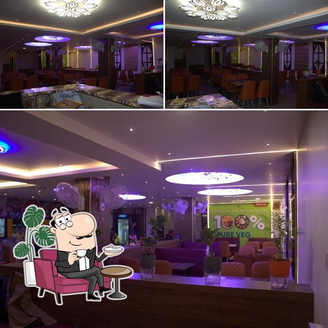 Check out how SPHOORTHY MULTI-CUISINE VEG RESTAURANT looks inside