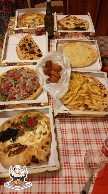 Prova una pizza a Pizzeria "Il Caminetto"