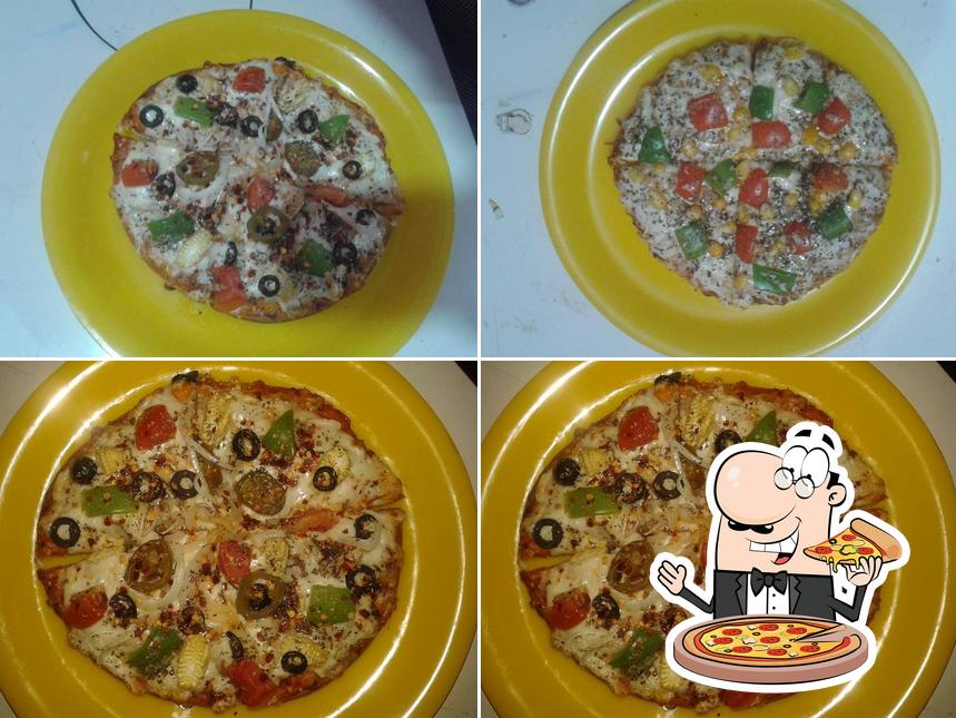 Try out pizza at Samarat Café