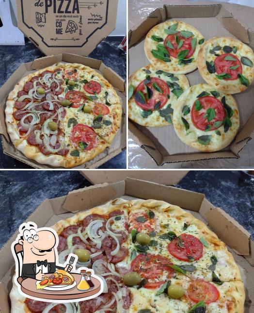 Consiga pizza no Bella Candeal pizzaria esfiharia