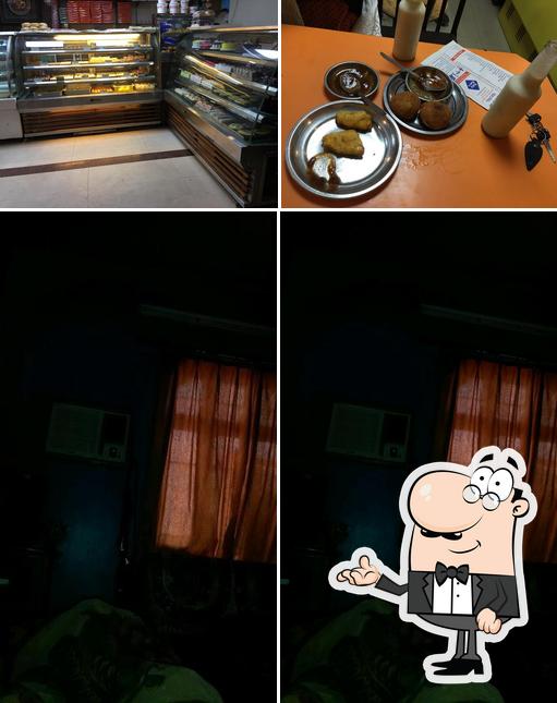 Check out the photo showing interior and food at Rajan Nayyar Refreshment Centre