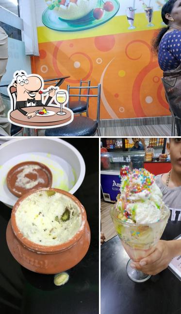 Among different things one can find food and interior at Scoops 'n' Smiles (Amul Ice cream parlour)