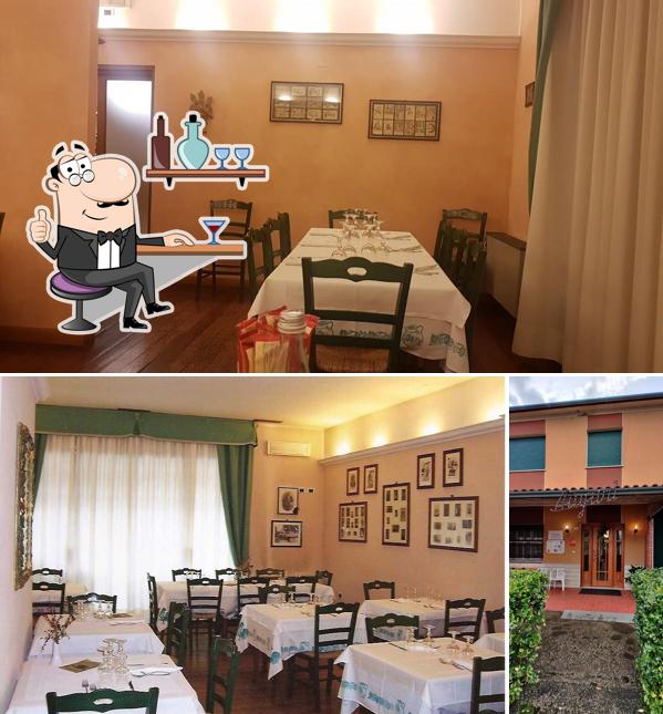 Tra le varie cose da Trattoria Bar Flora si possono trovare la interni e esterno