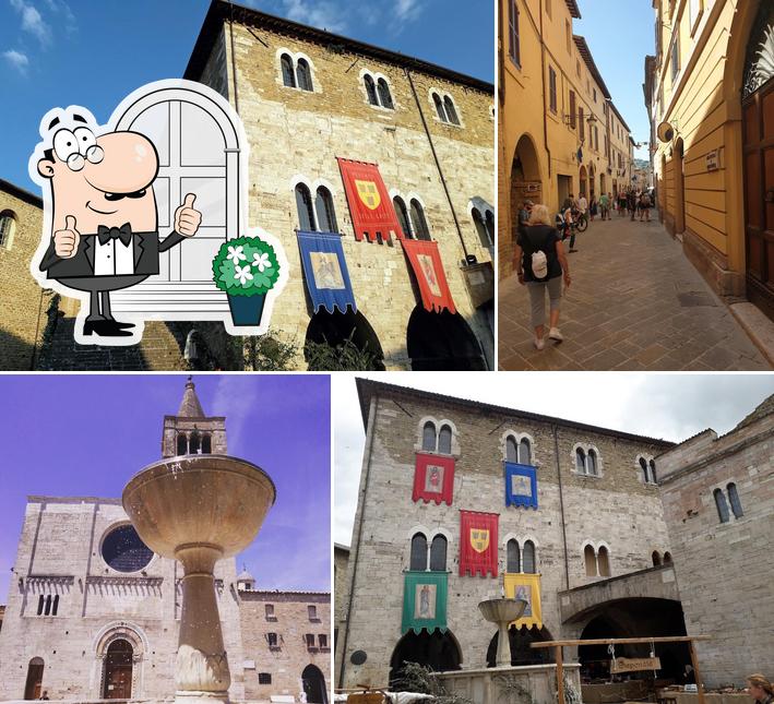 Goditi la vista dagli esterni di Trattoria in piazza TIP