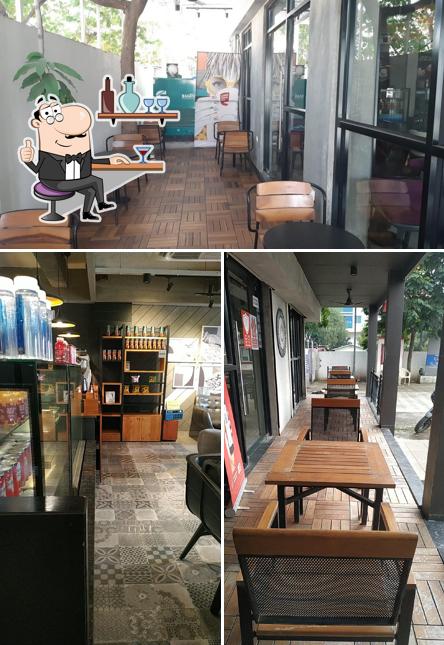Take a seat at one of the tables at Café Coffee Day