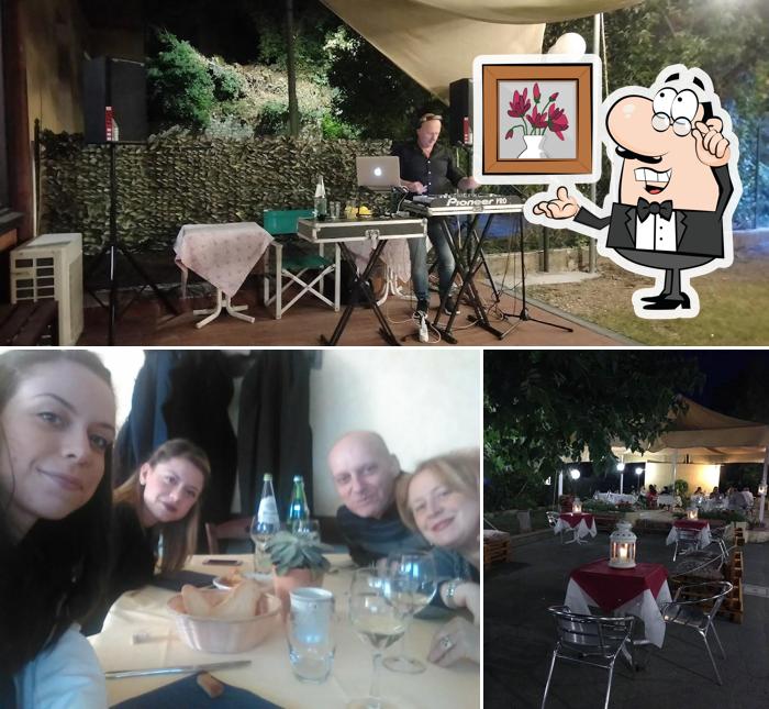 La immagine di interni e tavolo da pranzo da Lu Pilottu