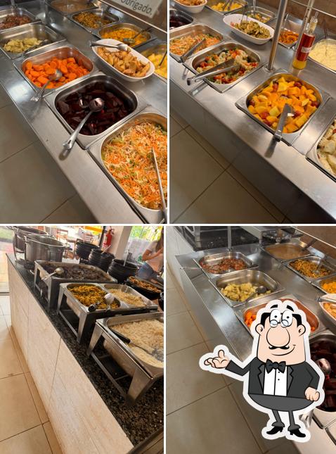 Sente em uma das mesas no Restaurante Ki Sabor