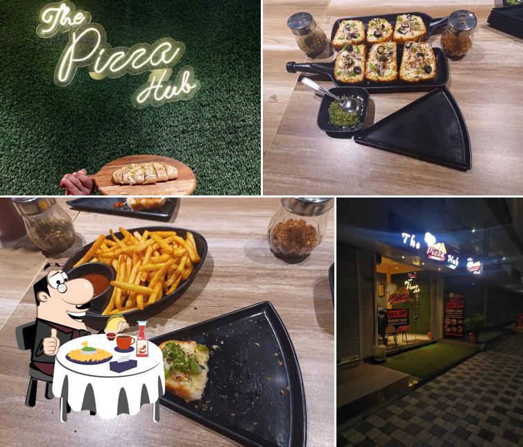 Try out a burger at The Pizza Hub