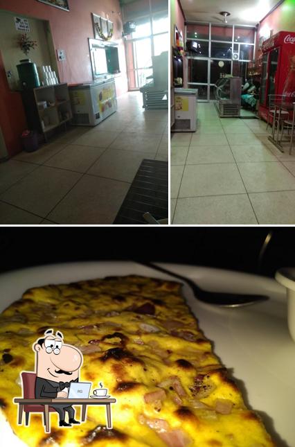 Among various things one can find interior and pizza at Govindam Restaurant