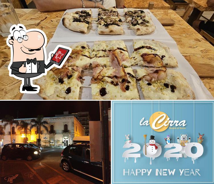 PINSERIA Pinsa& Pasta si caratterizza per la esterno e cibo