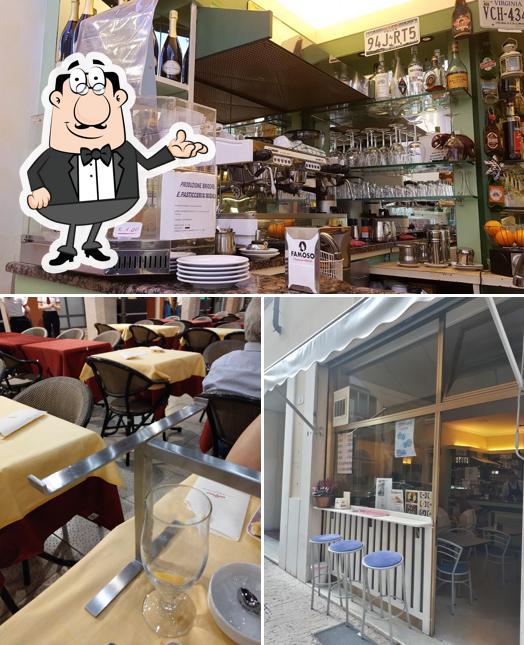 Questa è la immagine che presenta la interni e cibo di Mada Café