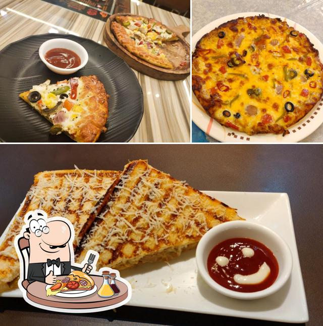 Pick pizza at THE CHASKA CAFE & RESTAURANT