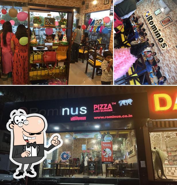 The exterior of Rominus Pizza And Burger