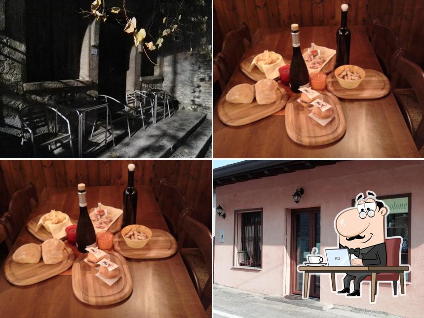 Dai un'occhiata agli interni di Osteria Nuvolone