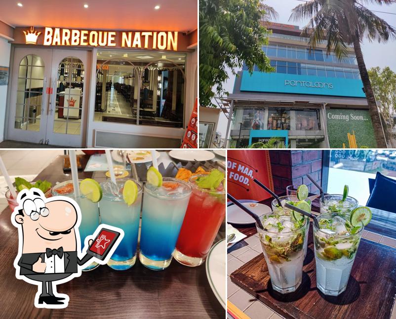 Take a look at the image showing exterior and drink at Barbeque Nation