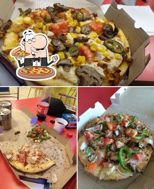 Pick pizza at Domino's Pizza Udit Nagar, Rourkela