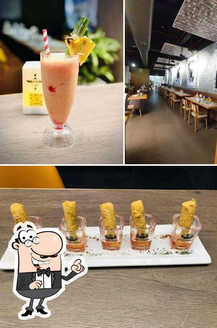 Take a seat at one of the tables at Atm Bar Mohali