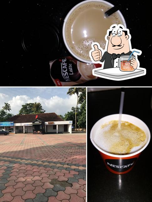 The photo of Nescafe Coffee Shop, Parumala Church’s drink and exterior