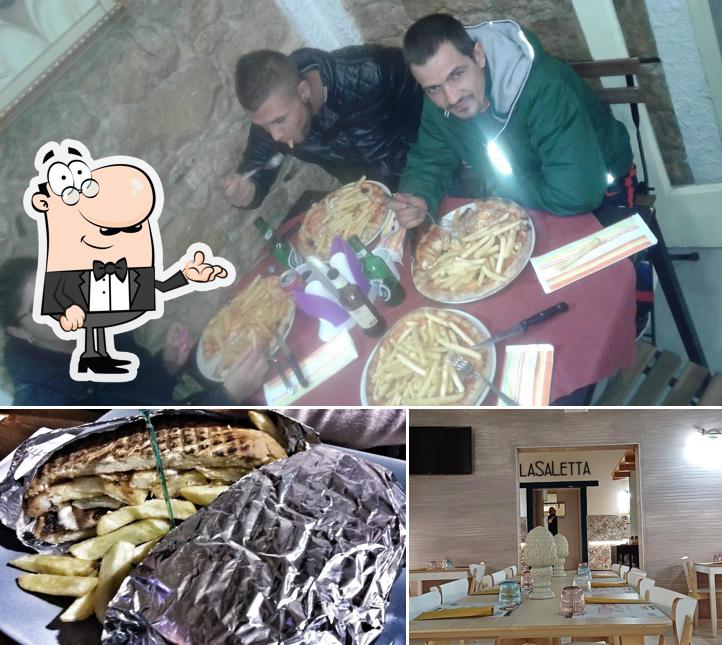 Dai un'occhiata agli interni di Pizzeria Del Corso