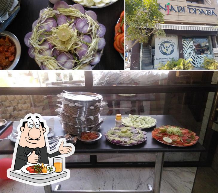 Take a look at the photo displaying food and exterior at Punjabi Dhaba