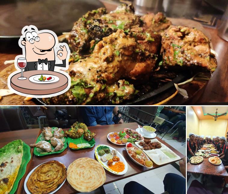 Among different things one can find food and dining table at Al-Rehan Zaika Restaurant (Rabodi Branch)