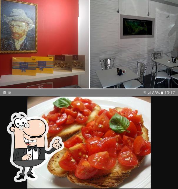 Questa è la foto che mostra la interni e cibo di bar il miraggio