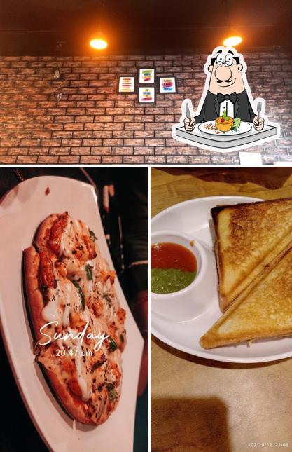 Take a look at the picture displaying food and exterior at 9 Ten Cafe. નાઇન ટેન કેફે