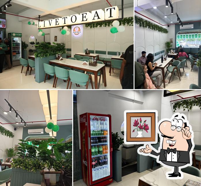 Check out how Martino'z Pizza New Ranip looks inside
