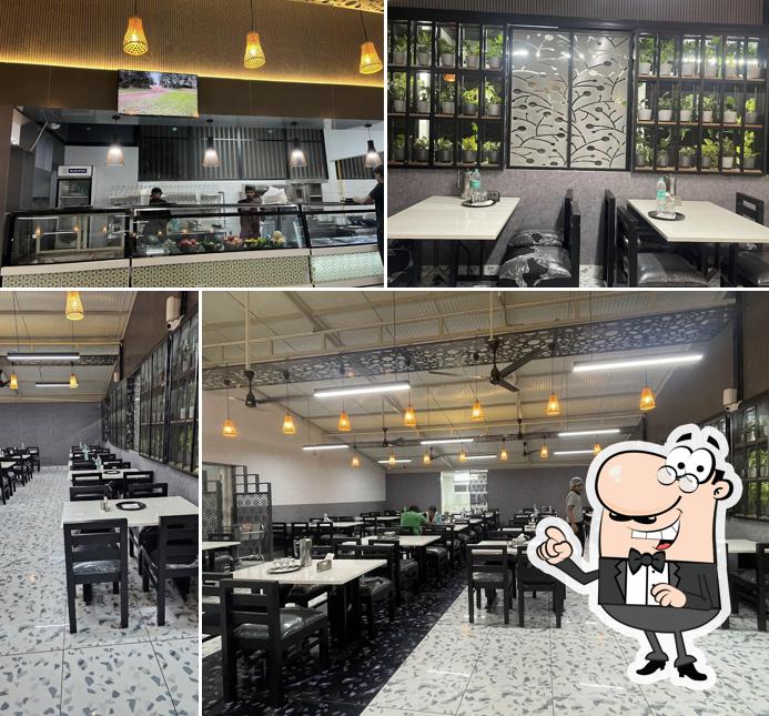 Take a seat at one of the tables at Chettais Family Restaurant Bangalore