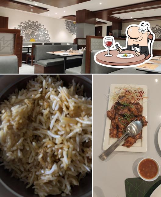 The photo of food and interior at Navarasa Restaurant