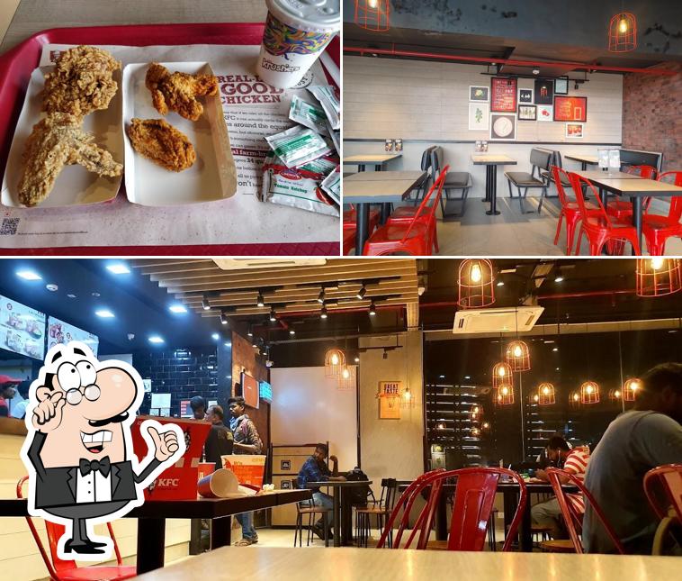 Take a seat at one of the tables at KFC Take a seat at one of the tables at KFC