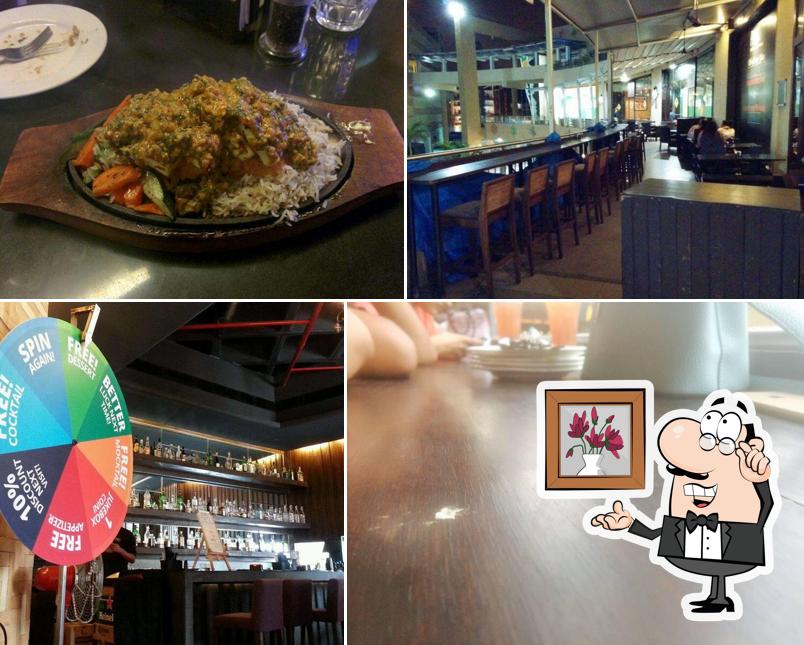 Take a seat at one of the tables at Plus 91